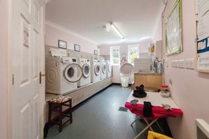 COMMUNAL LAUNDRY- click for photo gallery